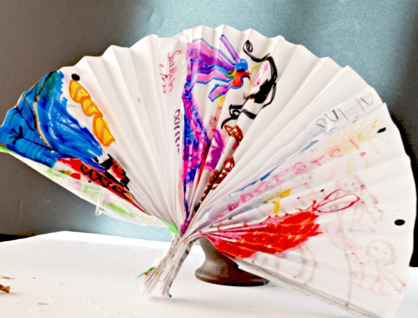 Looking for a fun and easy indoor craft idea? Make this adorable decorative fan paper craft for kids! All you need are two supplies and an imagination!