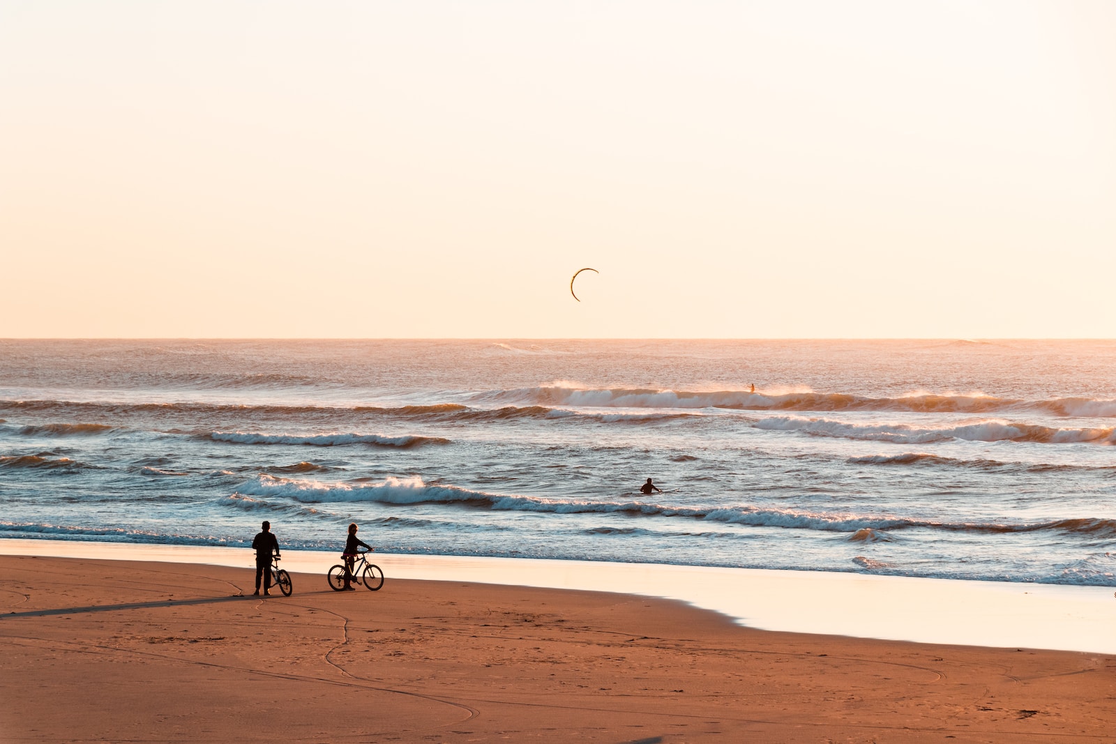 people walking on beach during daytime